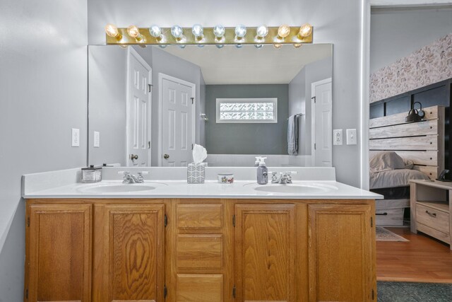 3630 W Trimble Rd, Milton, TN 37118 - full bath featuring double vanity, ensuite bath, and wood finished floors