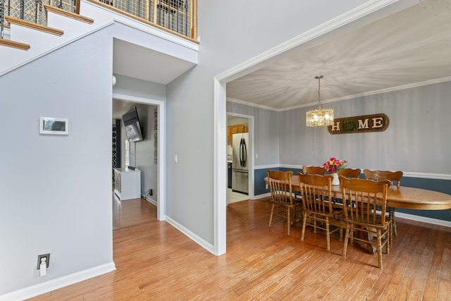 3630 W Trimble Rd, Milton, TN 37118 - dining room featuring a chandelier, wood finished floors, baseboards, and ornamental molding