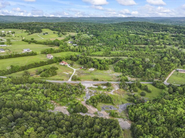 3630 W Trimble Rd, Milton, TN 37118 - aerial overview of property's location with a forest