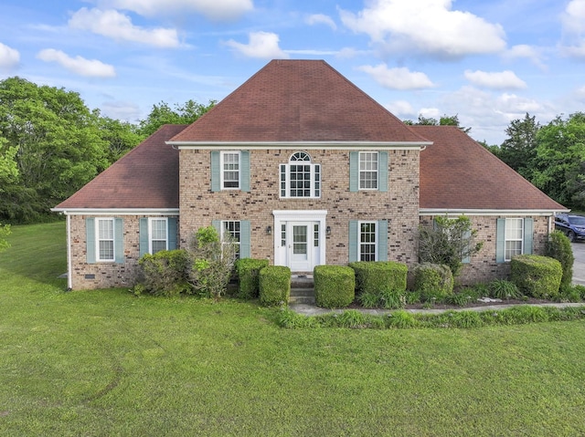 3630 W Trimble Rd, Milton, TN 37118 - view of front of house with brick siding, a front lawn, and a shingled roof