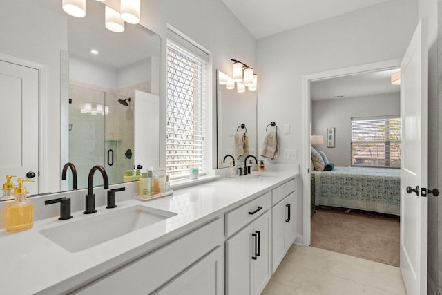full bathroom with connected bathroom, a shower stall, double vanity, and tile patterned flooring
