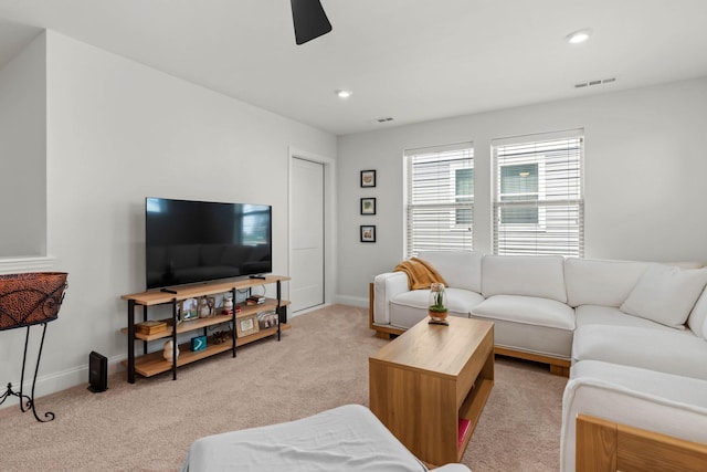 living area with carpet, baseboards, a ceiling fan, and recessed lighting