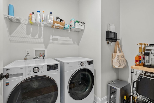 clothes washing area featuring washing machine and clothes dryer