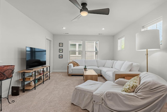 living area featuring carpet floors, ceiling fan, baseboards, and recessed lighting