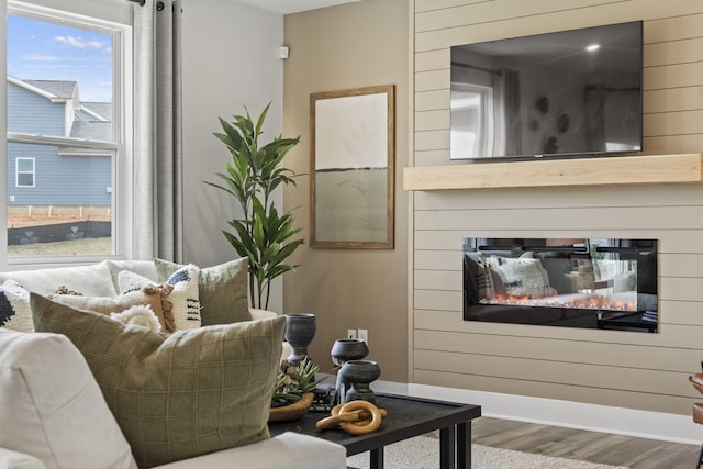 2562 Beverly Gail Rd, Pleasant View, TN 37146 - living room featuring a multi sided fireplace and wood finished floors