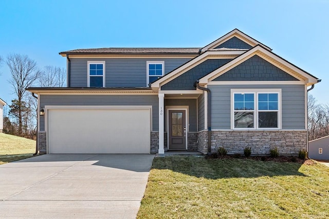 2562 Beverly Gail Rd, Pleasant View, TN 37146 - view of front of home with stone siding, driveway, a front lawn, and an attached garage