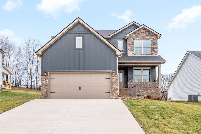 1912 Flats Rd, Cunningham, TN 37052 - craftsman-style house featuring board and batten siding, cooling unit, a porch, and a front lawn