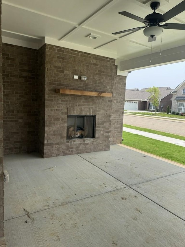 6709 Major Hutchings Dr, Hermitage, TN 37076 - view of patio / terrace featuring an outdoor brick fireplace and a ceiling fan
