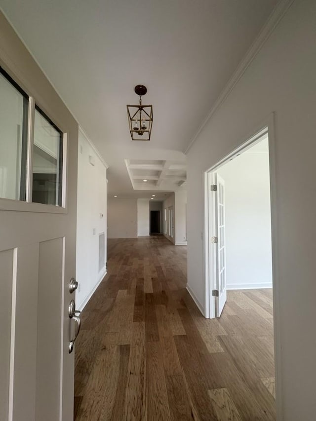 6709 Major Hutchings Dr, Hermitage, TN 37076 - corridor with wood finished floors, ornamental molding, and a chandelier