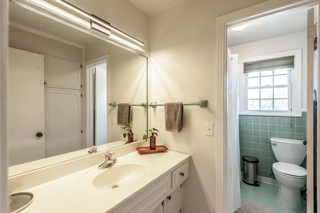 full bathroom with tile patterned floors, vanity, and toilet