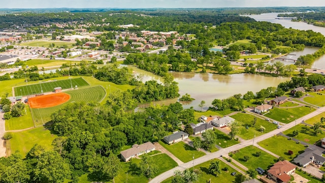 aerial perspective of suburban area featuring a nearby body of water