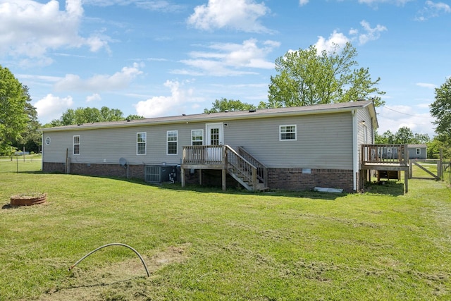 rear view of house featuring crawl space, a deck, central AC, and stairs