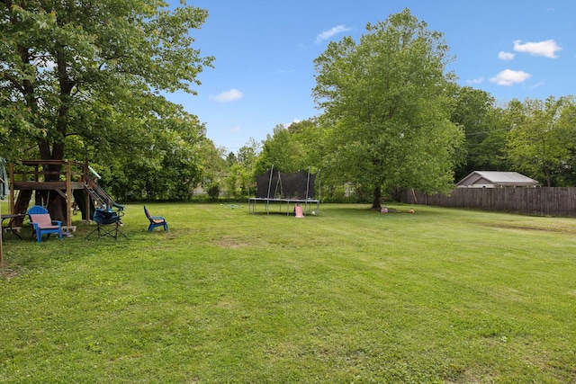 221 N Ewing St, Guthrie, KY 42234 - view of yard featuring a trampoline