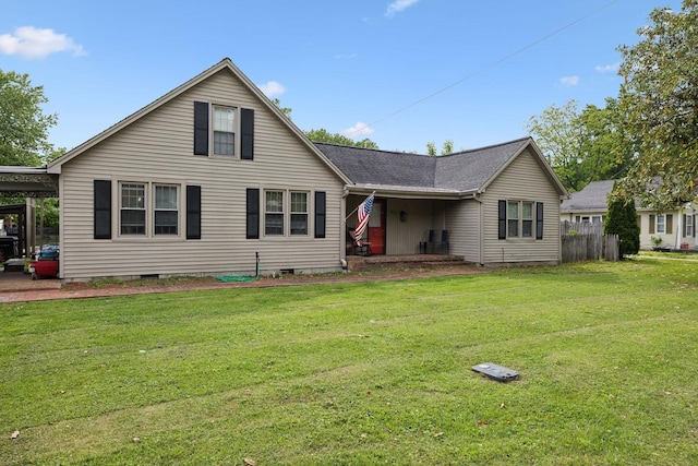 221 N Ewing St, Guthrie, KY 42234 - rear view of property featuring a yard