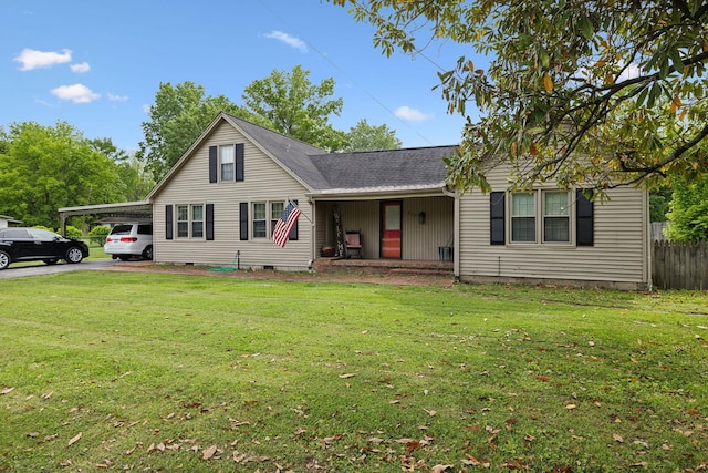 221 N Ewing St, Guthrie, KY 42234 - view of front of house featuring a carport, covered porch, asphalt driveway, and roof with shingles