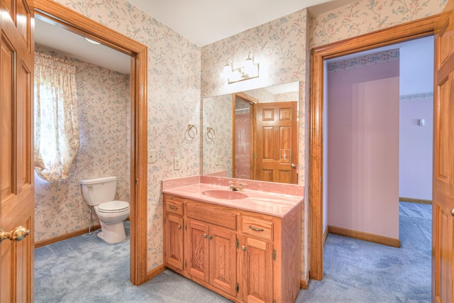 145 Dekewood Dr, Old Hickory, TN 37138 - bathroom with baseboards, toilet, vanity, and wallpapered walls