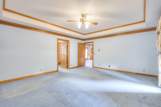 145 Dekewood Dr, Old Hickory, TN 37138 - unfurnished room featuring a tray ceiling, crown molding, light carpet, ceiling fan, and baseboards