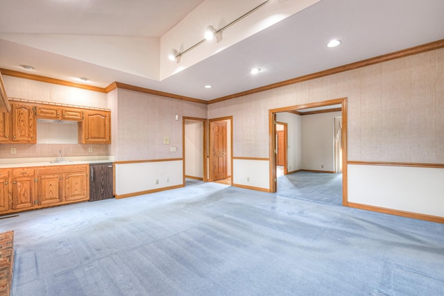 145 Dekewood Dr, Old Hickory, TN 37138 - unfurnished living room featuring crown molding, light colored carpet, a sink, lofted ceiling, and baseboards
