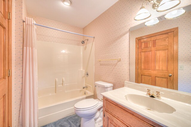 145 Dekewood Dr, Old Hickory, TN 37138 - full bathroom with wallpapered walls, toilet, shower / tub combo, and vanity