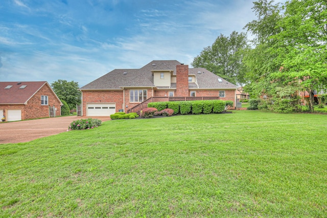 145 Dekewood Dr, Old Hickory, TN 37138 - traditional-style home with brick siding, driveway, a front yard, a chimney, and an attached garage