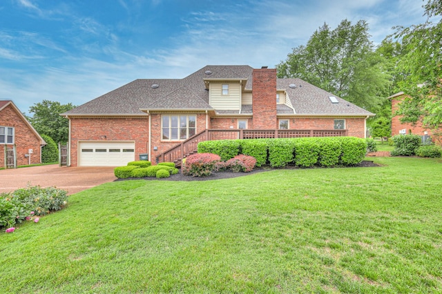 145 Dekewood Dr, Old Hickory, TN 37138 - view of front of home with brick siding, driveway, a chimney, a front yard, and stairway