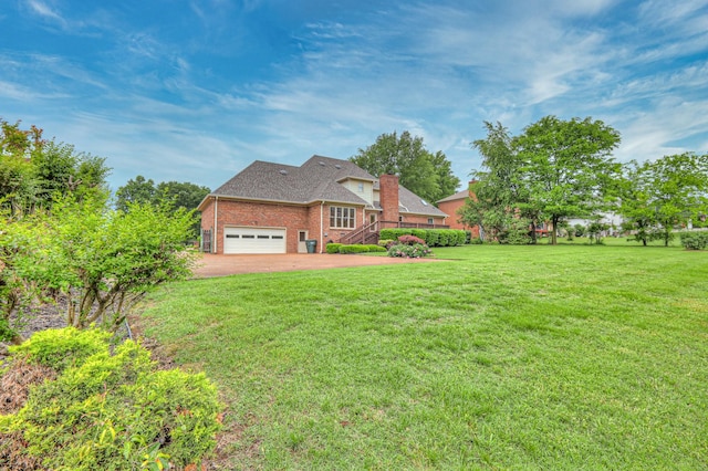 145 Dekewood Dr, Old Hickory, TN 37138 - view of front of property featuring brick siding, an attached garage, a front yard, dirt driveway, and a chimney