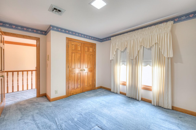 145 Dekewood Dr, Old Hickory, TN 37138 - unfurnished bedroom with carpet flooring, baseboards, and a closet
