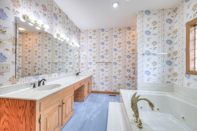145 Dekewood Dr, Old Hickory, TN 37138 - full bathroom with a jetted tub, double vanity, baseboards, tile patterned flooring, and wallpapered walls