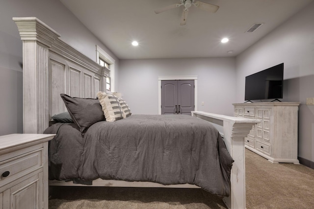 bedroom featuring light carpet, baseboards, recessed lighting, and a ceiling fan