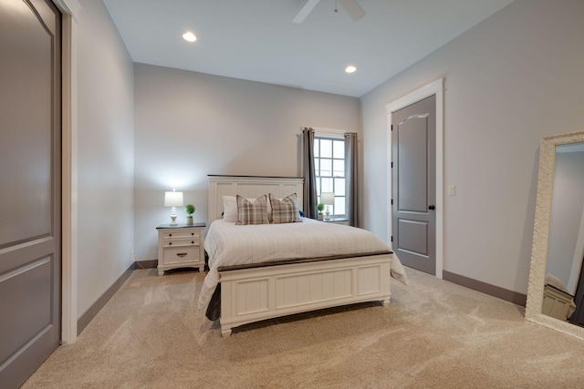bedroom with light carpet, baseboards, a ceiling fan, and recessed lighting