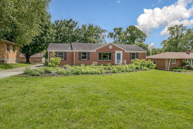 2413 Dundee Ln, Nashville, TN 37214 - ranch-style home featuring a front yard and brick siding