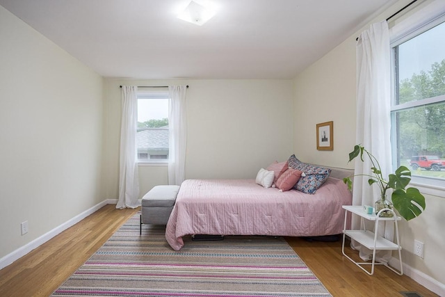 2413 Dundee Ln, Nashville, TN 37214 - bedroom with wood finished floors and baseboards