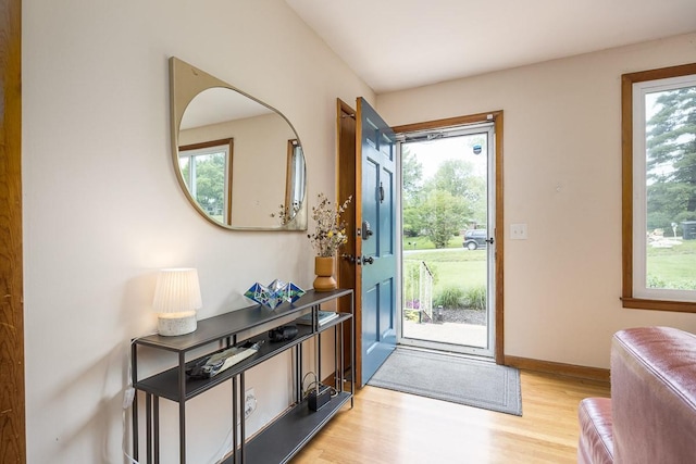 2413 Dundee Ln, Nashville, TN 37214 - doorway to outside featuring wood finished floors, healthy amount of natural light, and baseboards