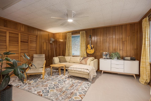2413 Dundee Ln, Nashville, TN 37214 - living area featuring a ceiling fan and wooden walls