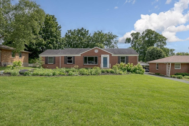 2413 Dundee Ln, Nashville, TN 37214 - single story home featuring a front yard and brick siding