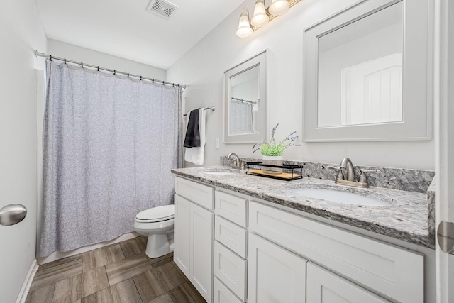 1006 Brinxton Run, Murfreesboro, TN 37128 - full bath with toilet, double vanity, baseboards, and a shower with shower curtain