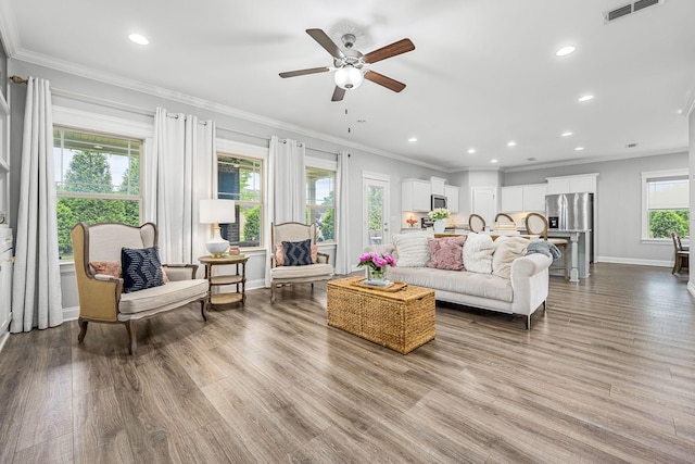 1006 Brinxton Run, Murfreesboro, TN 37128 - living room with a ceiling fan, wood finished floors, ornamental molding, baseboards, and recessed lighting