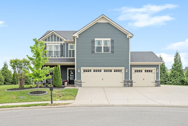 1006 Brinxton Run, Murfreesboro, TN 37128 - craftsman house featuring concrete driveway, stone siding, a front yard, an attached garage, and a shingled roof