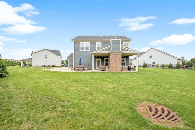 1006 Brinxton Run, Murfreesboro, TN 37128 - rear view of house with a patio area, a lawn, and an outdoor hangout area