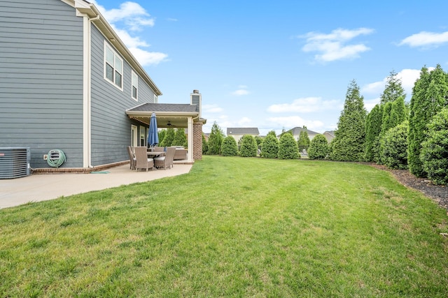 1006 Brinxton Run, Murfreesboro, TN 37128 - view of grassy yard featuring a ceiling fan, a patio, and cooling unit