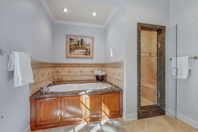 bathroom featuring a stall shower, a garden tub, crown molding, tile patterned flooring, and recessed lighting