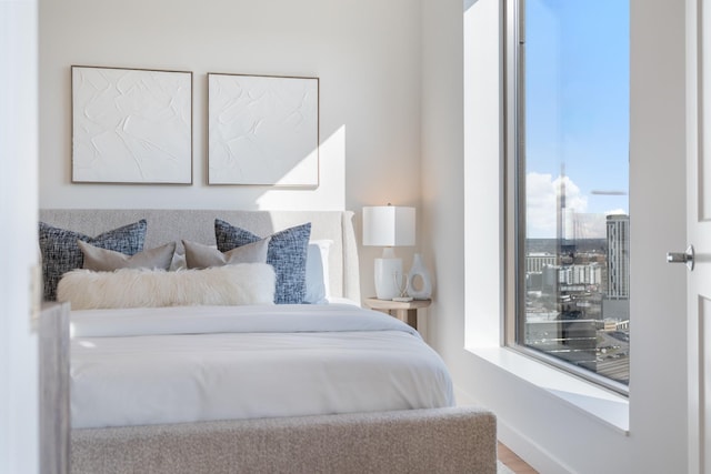 bedroom featuring wood finished floors