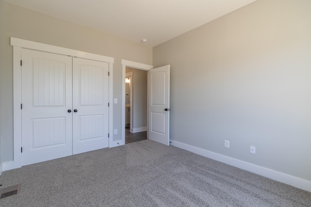 1161 Goose Dr, Springfield, TN 37172 - unfurnished bedroom with carpet, baseboards, and a closet