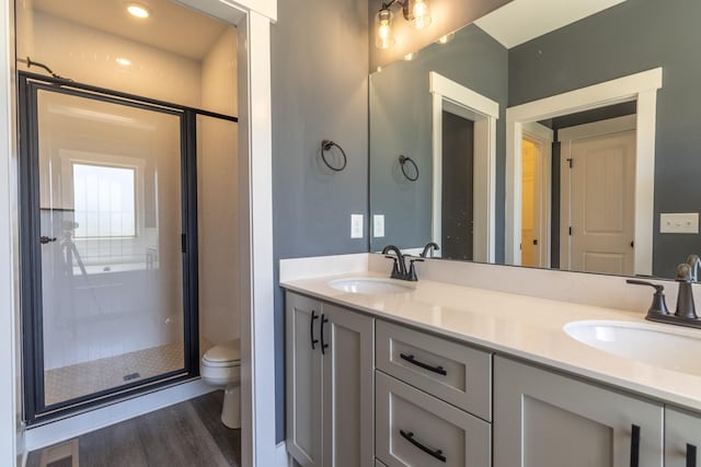 1161 Goose Dr, Springfield, TN 37172 - full bath featuring a shower stall, wood finished floors, toilet, and double vanity