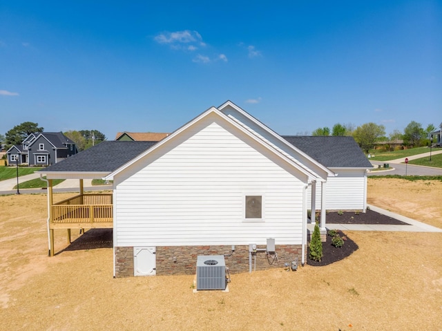1137 Goose Dr, Springfield, TN 37172 - view of side of home featuring cooling unit and a shingled roof