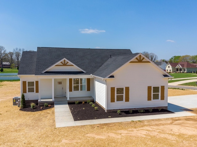 1137 Goose Dr, Springfield, TN 37172 - modern farmhouse style home featuring covered porch and a shingled roof