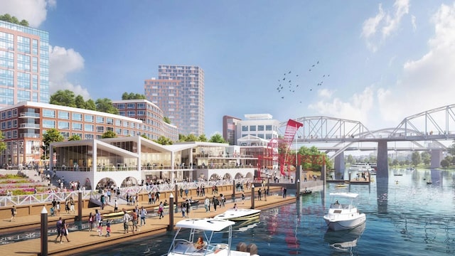 view of community with a boat dock, a water view, and a view of city