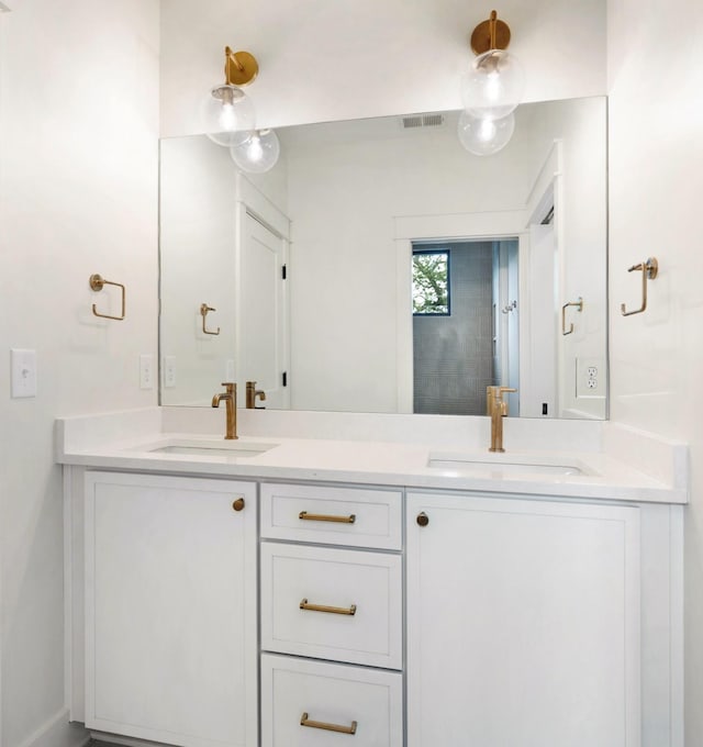 bathroom with double vanity