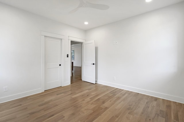unfurnished bedroom featuring light wood-type flooring, baseboards, recessed lighting, and ceiling fan