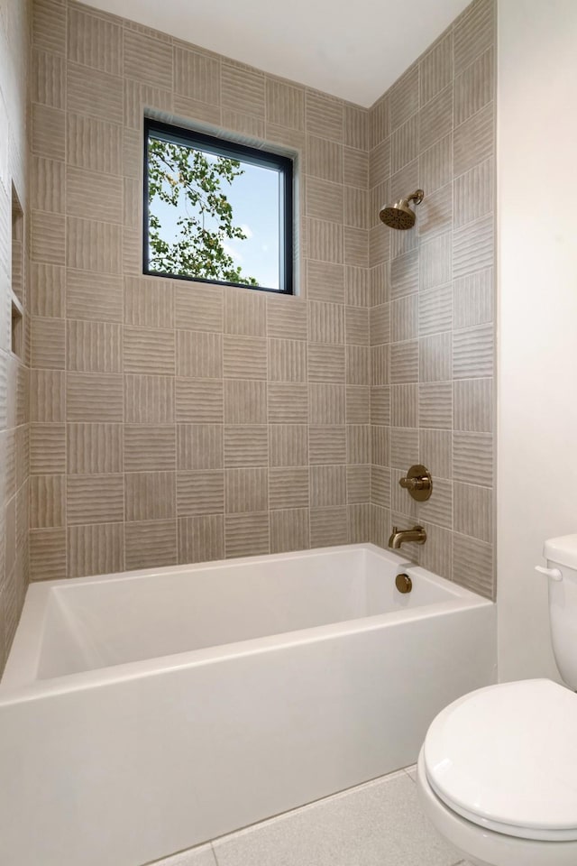 full bathroom featuring toilet and shower / tub combination